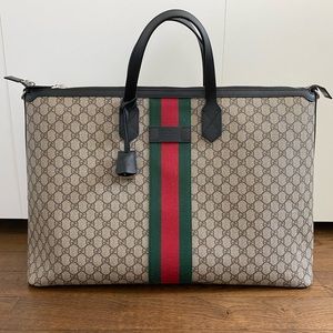 Gucci monogram coated canvas travel bag w/ clochette , lock, keys, travel tag